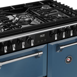 Twilight blue 90cm dual fuel range cooker with multiple gas burners, digital clock, and chrome handles, Eastbourne Uckfield. - DB Domestics