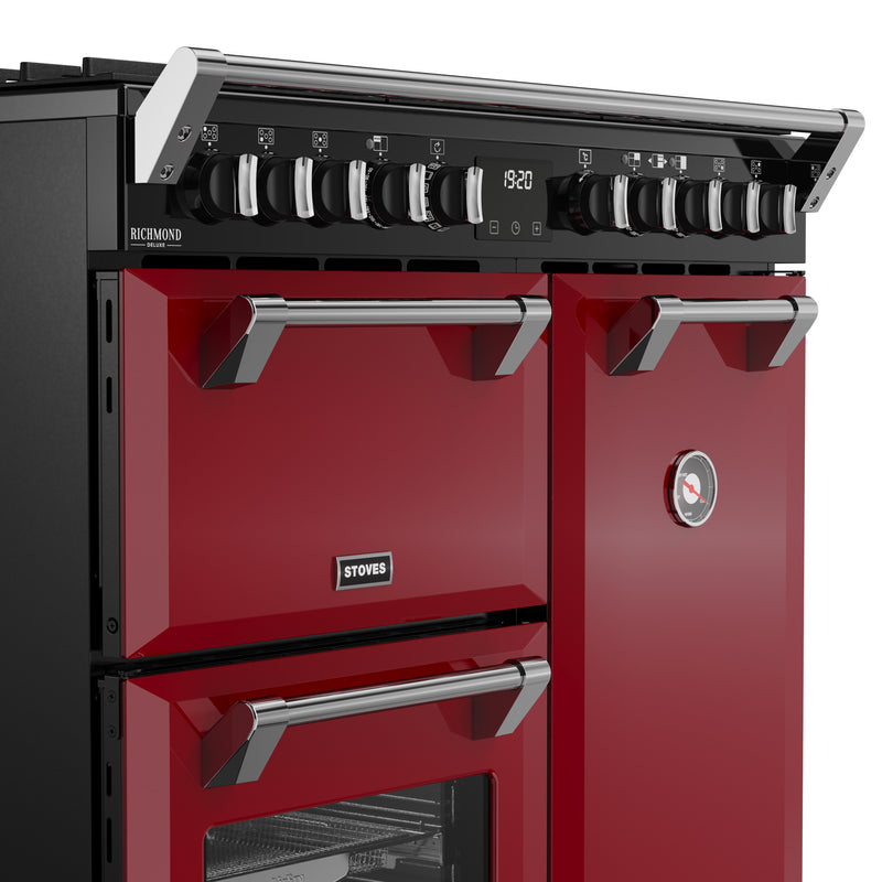 Garnet red 90cm dual fuel range cooker with six black and chrome knobs, triple oven doors, and stainless steel handles –. - DB Domestics