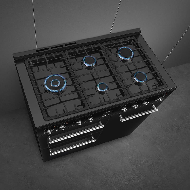 Black Smeg 100cm dual fuel range cooker with five burners and two ovens, offered with Free Delivery to Eastbourne and. - DB Domestics