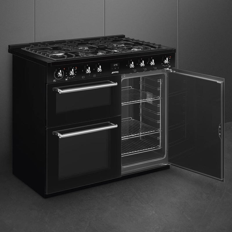 Black Smeg Concert Classic CX103GMBL 100cm dual fuel range cooker with open oven door, stainless handles, and control knobs, . - DB Domestics