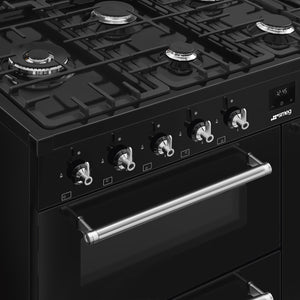 Black Smeg 110cm dual fuel range cooker with five burners and stainless steel handle, Eastbourne Uckfield Free Delivery. - DB Domestics