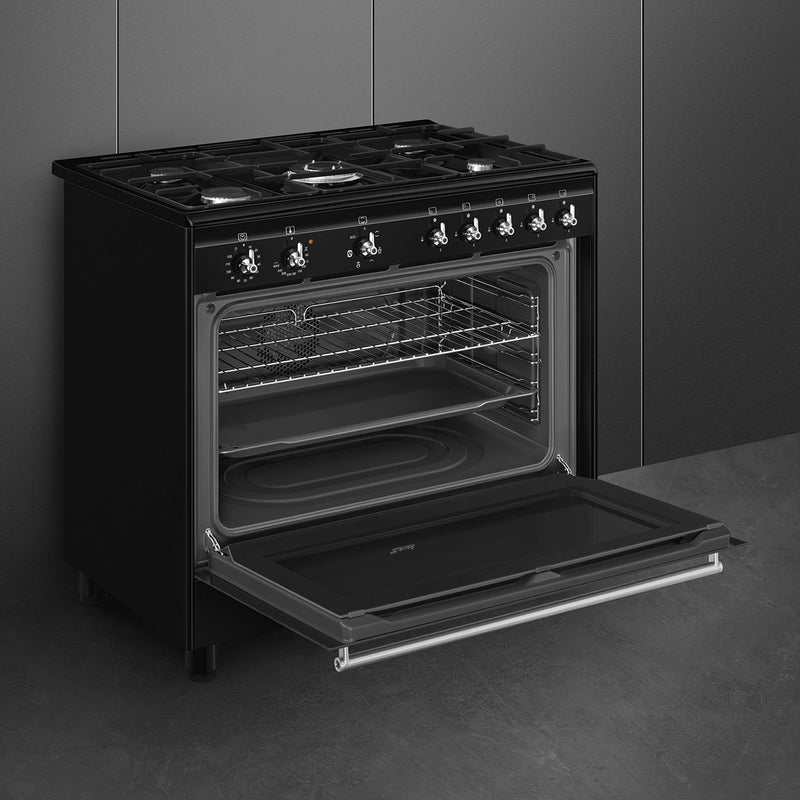Black Smeg 90cm dual fuel range cooker with open oven door, classic design, available for Free Delivery in Eastbourne and. - DB Domestics