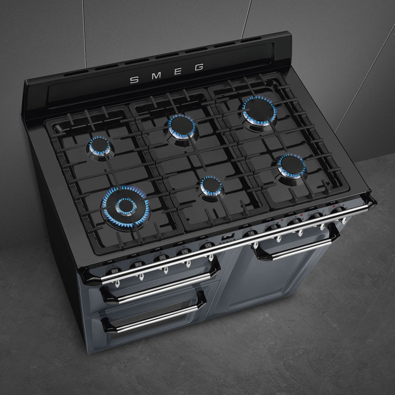 Slate grey Smeg Victoria TR103GR 100cm dual fuel range cooker with five burners and two ovens, featured with Free Delivery. - DB Domestics